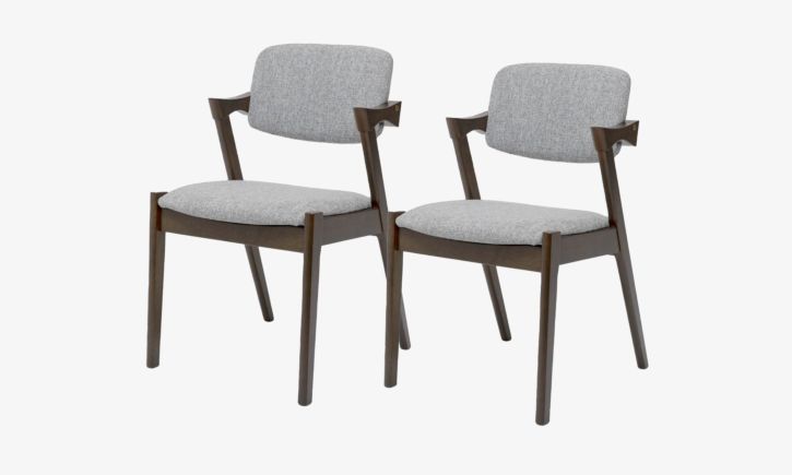 Angled view of Atlas Dining Chair made of rubber wood upholstered with grey fabric