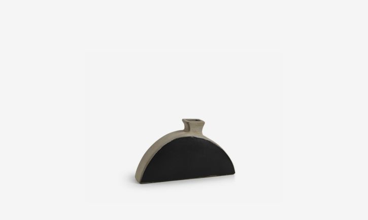 Stylish medium sized ceramic vase in natural and bold black.
