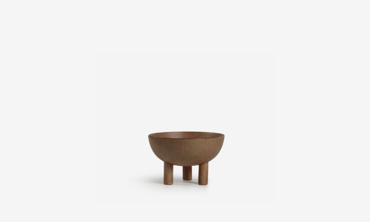 A brown scandinavian-inspired three-legged bowl, perfect for decorative or functional piece.