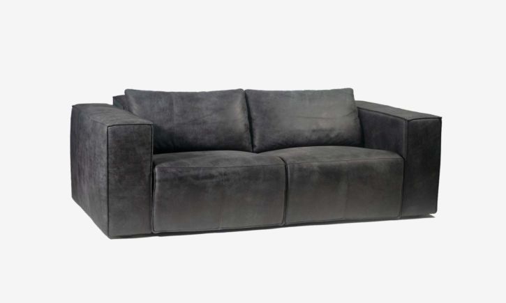 Product photo of Beaumont 2 seater recliner sofa in Leather raw black 
 Angled view