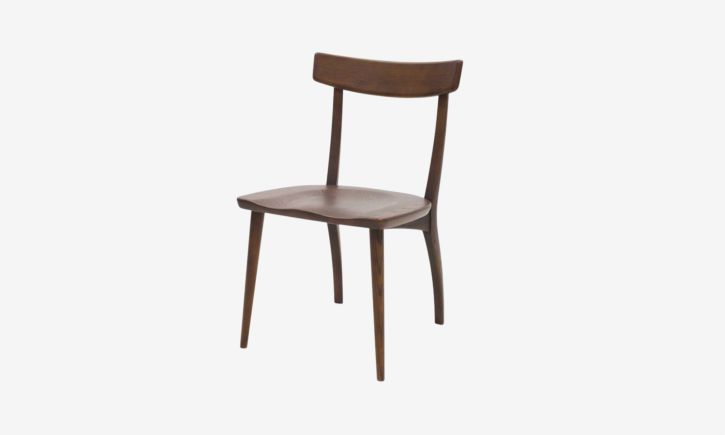Product photo Nami dining chair in caramel oak angle photo.